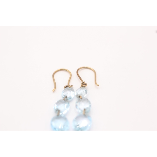 115 - 9ct gold faceted blue topaz drop earrings with French hooks  2.1 g