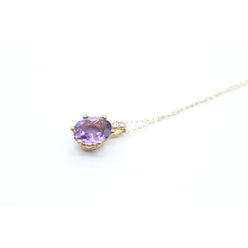 9ct gold oval cut amethyst & diamond pendant necklace, claw set with heart patterned gallery  2.2 g