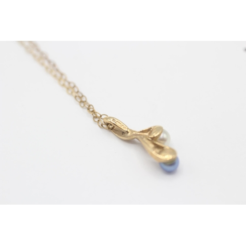 62 - 9ct gold cultured pearl twist pendant on chain  1.6 g
