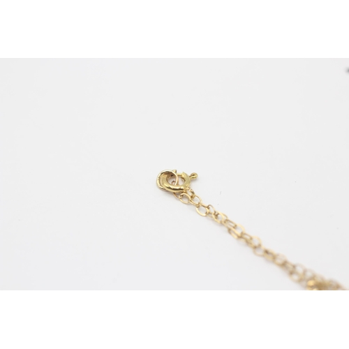 62 - 9ct gold cultured pearl twist pendant on chain  1.6 g