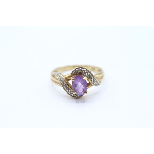 68 - 9ct gold amethyst single stone twist ring with diamond accent Size M 2.3 g