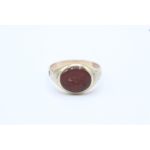 91 - 14ct gold band and 5ct gold headed antique carnelian bull intaglio set signet ring - as seen Size O ... 