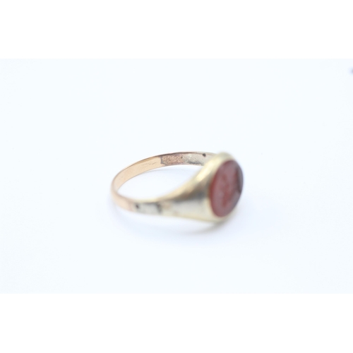 91 - 14ct gold band and 5ct gold headed antique carnelian bull intaglio set signet ring - as seen Size O ... 