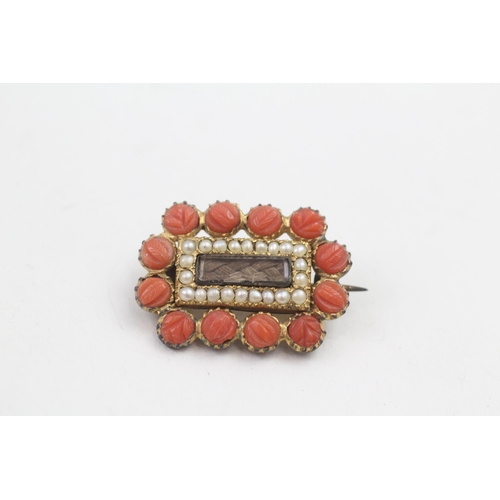 335 - Two Victorian brooches including a coral set mourning brooch (29g)