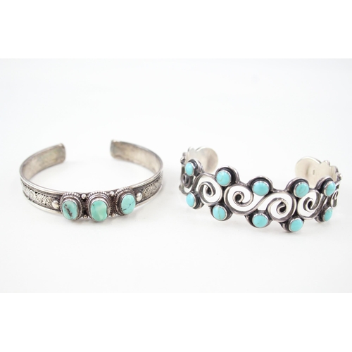 344 - Two silver stone set bangles (57g)