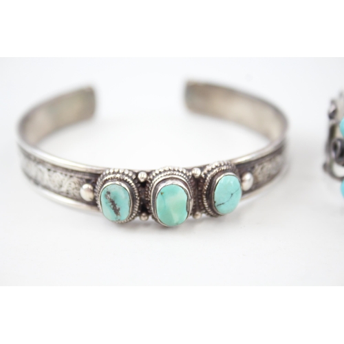 344 - Two silver stone set bangles (57g)