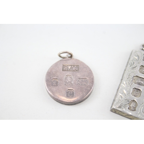 355 - Two sterling silver ingot pendants (44g)