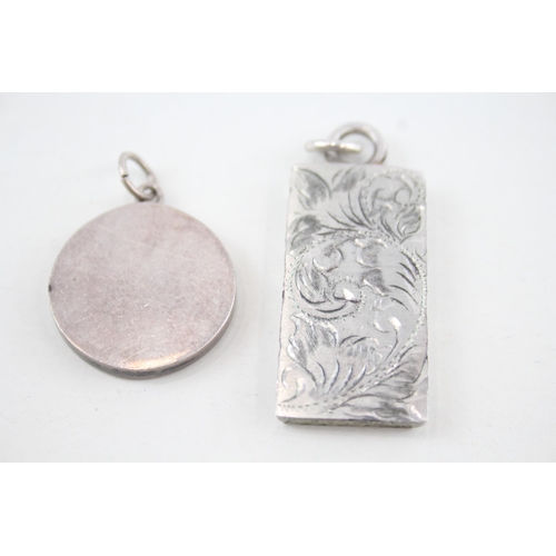 355 - Two sterling silver ingot pendants (44g)