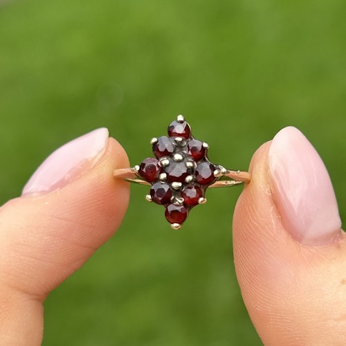 111 - 9ct gold garnet marquise shaped cluster ring Size J 2.3 g