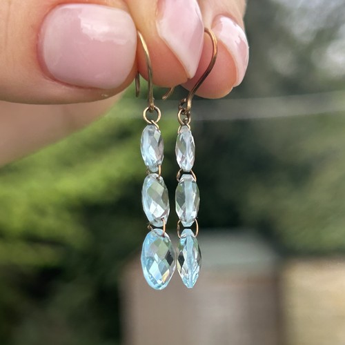 115 - 9ct gold faceted blue topaz drop earrings with French hooks  2.1 g