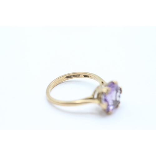 20 - 9ct gold vintage amethyst dress ring with a heart patterned gallery. Hallmarked Edinburgh 1968 Size ... 