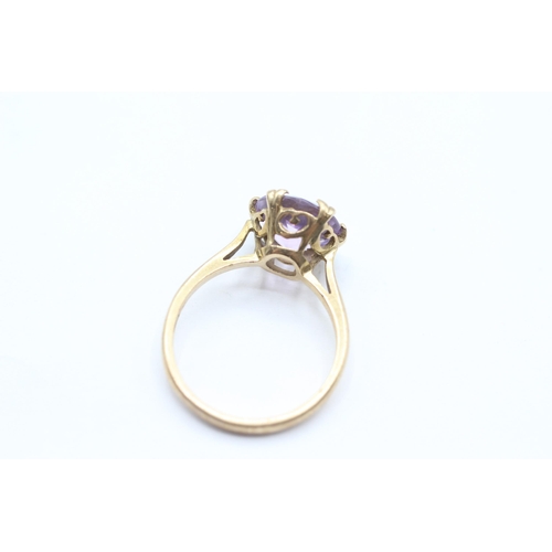 20 - 9ct gold vintage amethyst dress ring with a heart patterned gallery. Hallmarked Edinburgh 1968 Size ... 