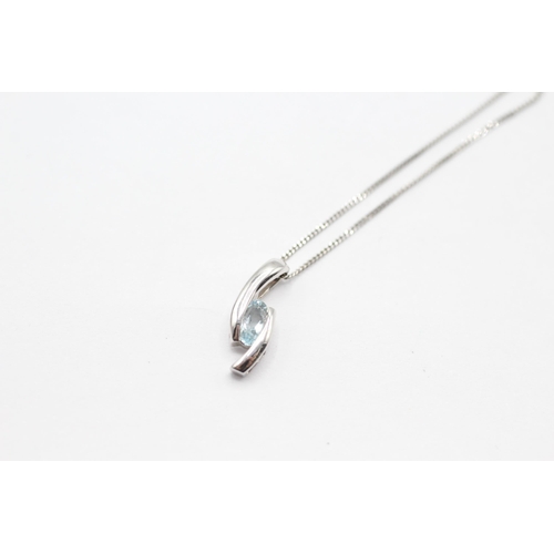 23 - 9ct white gold blue topaz pendant necklace   - 1.4 g