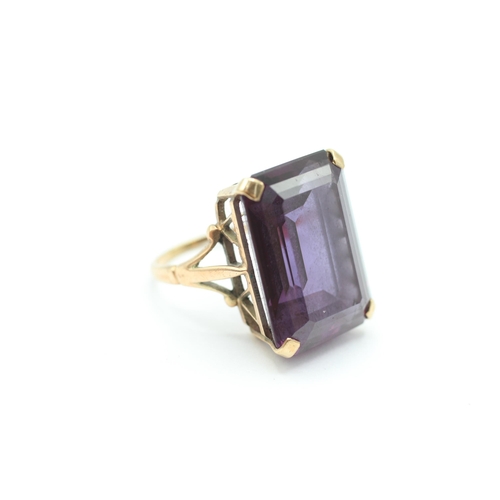 27 - 9ct gold emerald cut purple gemstone dress ring Size  N - 11 g