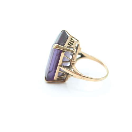 27 - 9ct gold emerald cut purple gemstone dress ring Size  N - 11 g