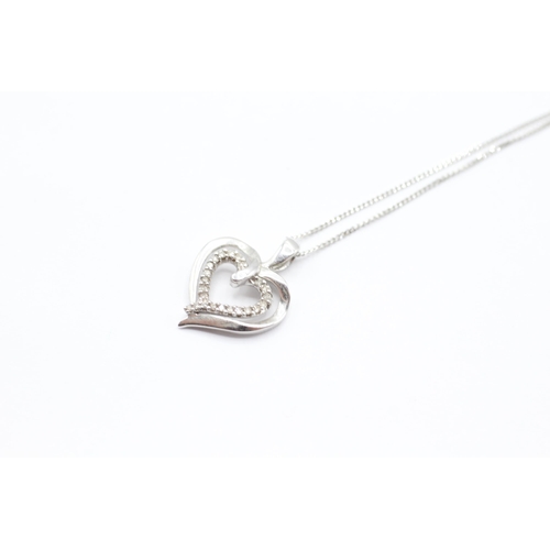 35 - 9ct white gold diamond heart pendant on chain   - 2.2 g