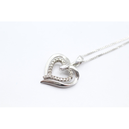 35 - 9ct white gold diamond heart pendant on chain   - 2.2 g