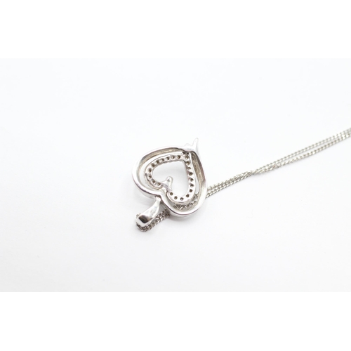 35 - 9ct white gold diamond heart pendant on chain   - 2.2 g