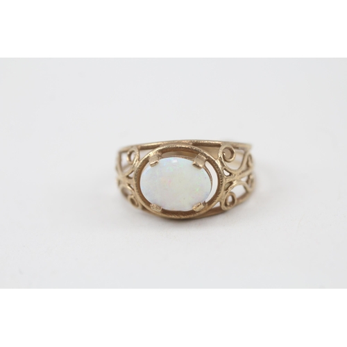 49 - 9ct gold white opal single stone ring with openwork shank Size  L - 2 g