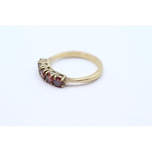 51 - 9ct gold red gemstone five stone ring Size  P - 3 g