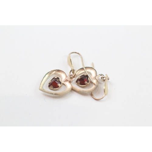 73 - 9ct gold garnet heart shaped earrings with French hooks (0.5g)