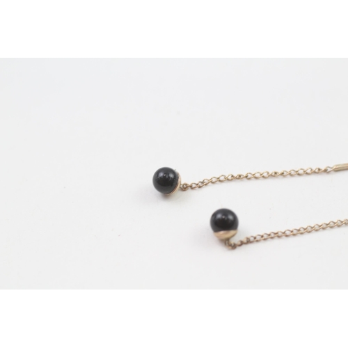 75 - 9ct gold black onyx drop earrings (0.5g)