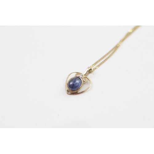 76 - 9ct gold cabochon cut sapphire & diamond pendant necklace (1g)