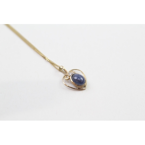 76 - 9ct gold cabochon cut sapphire & diamond pendant necklace (1g)