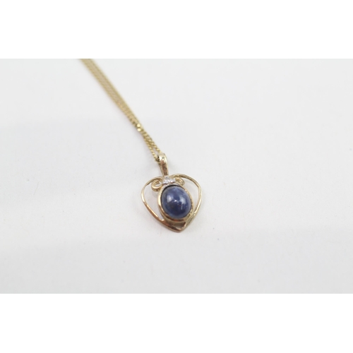 76 - 9ct gold cabochon cut sapphire & diamond pendant necklace (1g)