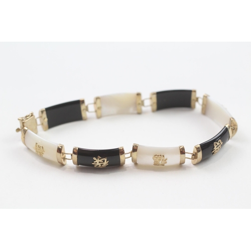 78 - 9ct gold mother & pearl & black onyx bracelet with Chinese symbols (10.8g)