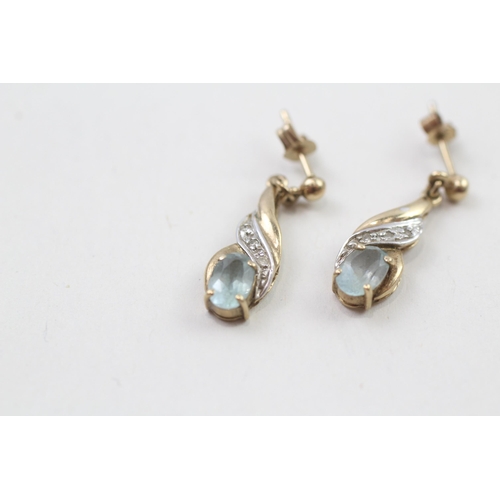 82 - 9ct gold blue topaz & diamond drop earrings with scroll backs (1.8g)