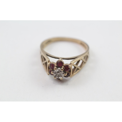 86 - 9ct gold 1970's ruby & diamond cluster ring with pierced patterned shoulders (2.5g) Size  N