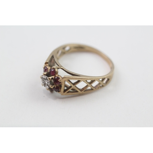 86 - 9ct gold 1970's ruby & diamond cluster ring with pierced patterned shoulders (2.5g) Size  N