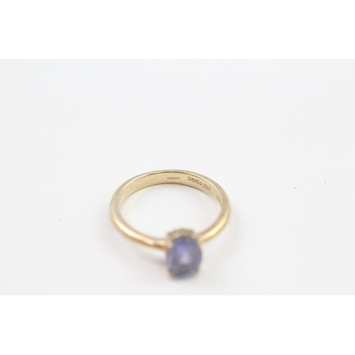 89 - 9ct gold oval cut tanzanite solitaire ring, claw set (2g) Size  J