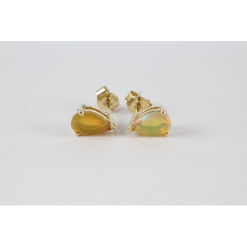 90 - 10ct gold pear cut opal stud earrings with scroll backs (1.5g)