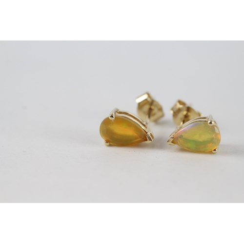 90 - 10ct gold pear cut opal stud earrings with scroll backs (1.5g)