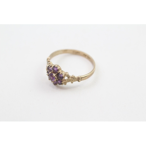 92 - 9ct gold amethyst cluster ring with patterned shoulders, Hallmarked Edinburgh 1994 (1.4g) Size  M