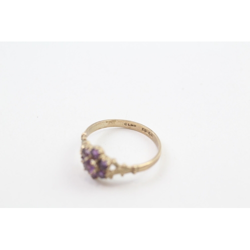 92 - 9ct gold amethyst cluster ring with patterned shoulders, Hallmarked Edinburgh 1994 (1.4g) Size  M