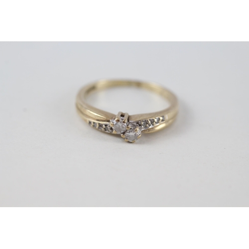 96 - 9ct gold diamond toi et moi ring with diamond shoulders (total diamond weight: 0.20ct approximately)... 