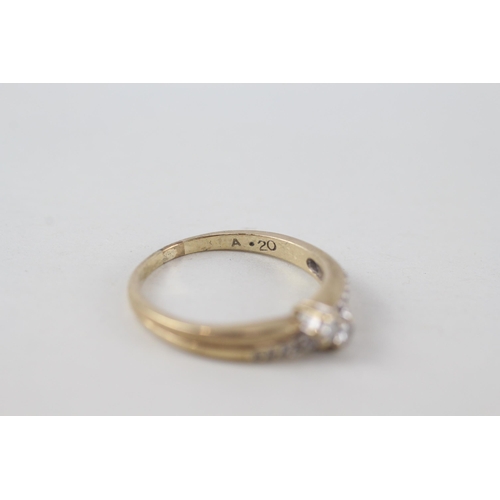 96 - 9ct gold diamond toi et moi ring with diamond shoulders (total diamond weight: 0.20ct approximately)... 