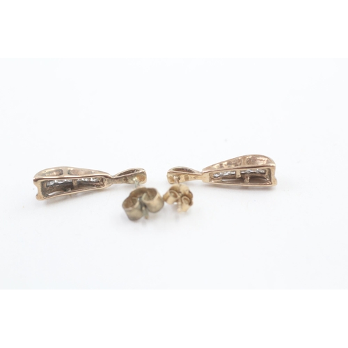 99 - 9ct gold diamond drop earrings with scroll backs (1.6g)