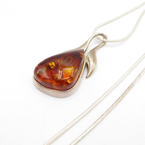 395 - Hallmarked 925 silver and amber necklace and chain, chain measures 45cm, pendant measures 5cm (20.8g... 