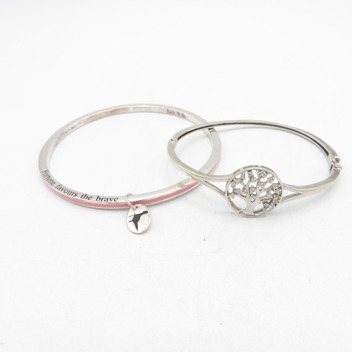 407 - 2x hallmarked silver bracelets - one with silver enamel and one with white gemstone tree (28.8g)