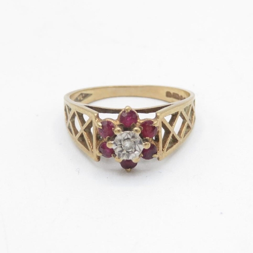 86 - 9ct gold 1970's ruby & diamond cluster ring with pierced patterned shoulders (2.5g) Size  N