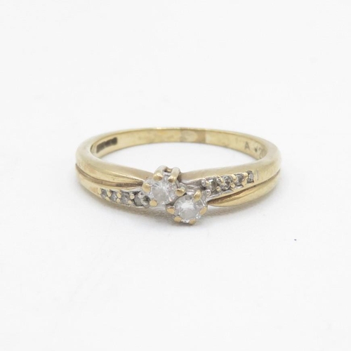 96 - 9ct gold diamond toi et moi ring with diamond shoulders (total diamond weight: 0.20ct approximately)... 