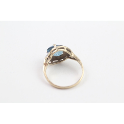 1 - 9ct gold oval cut blue topaz & diamond dress ring (2.1g) Size  J