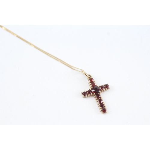 103 - 9ct gold garnet cross pendant necklace, claw set (1.6g)