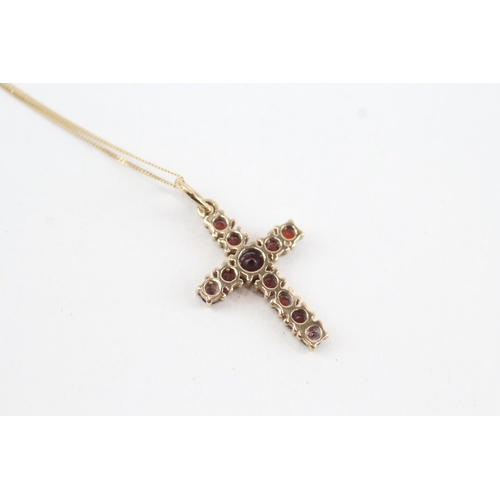 103 - 9ct gold garnet cross pendant necklace, claw set (1.6g)