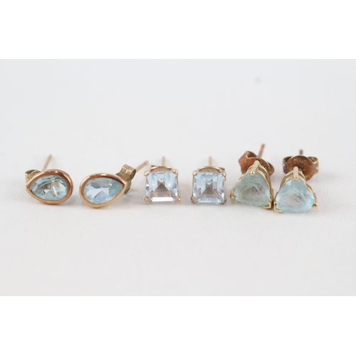 106 - 3 x 9ct gold topaz stud earrings (2.6g)