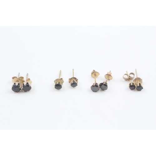 108 - 4 x 9ct gold sapphire stud earrings (1.3g)